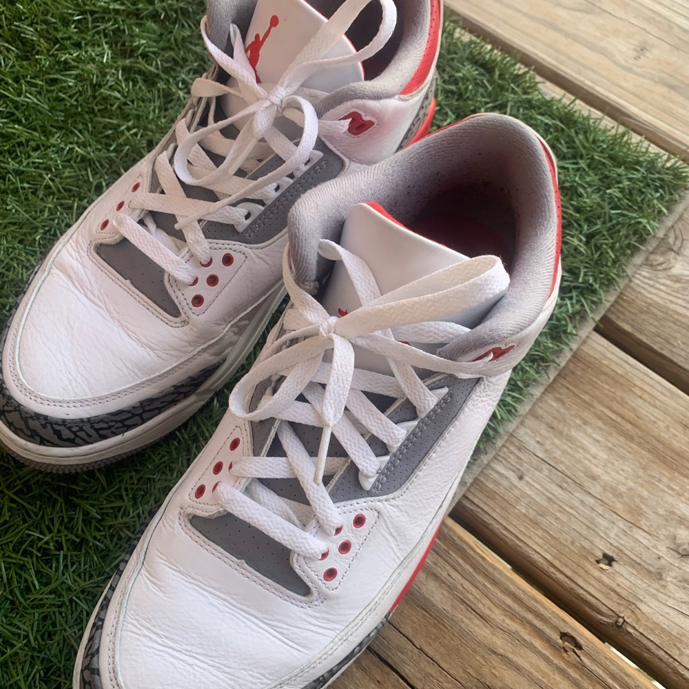 White and Gray Sneakers with Red Accents